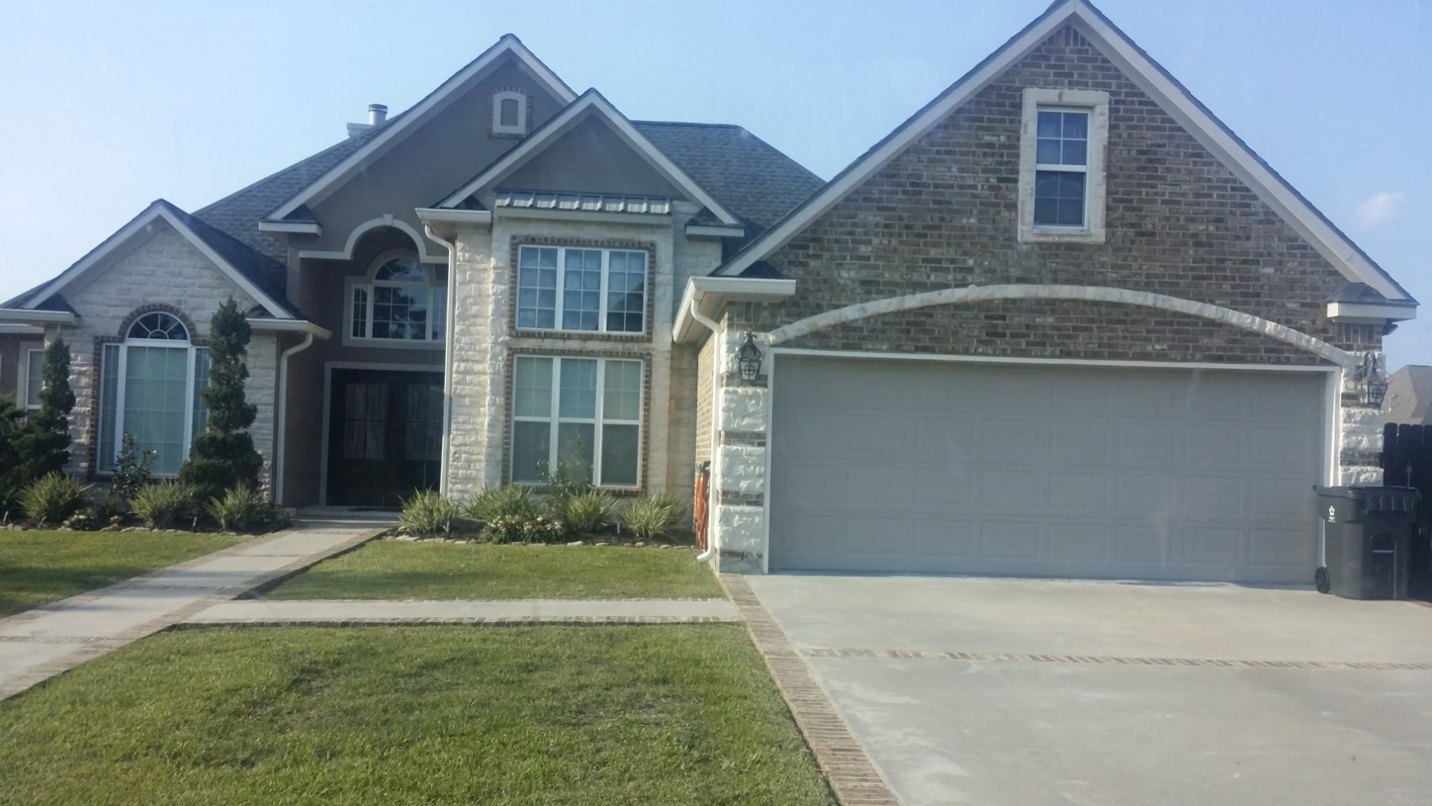 Two-Story Stone & Brick Estate